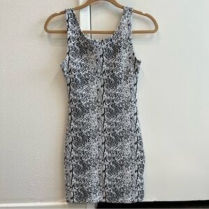 H&M Divided Sleeveless short black white Tank dress with round neckline. Size 4